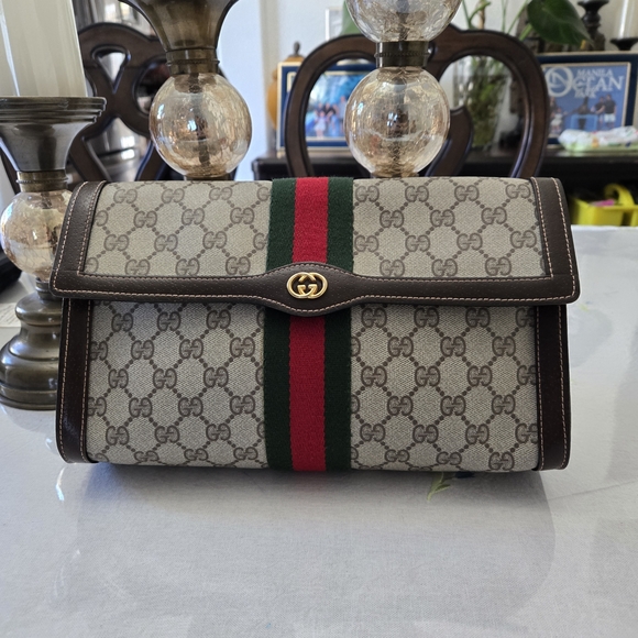 Gucci Beige and Brown Logo Clutch with Red and Green Stripe.